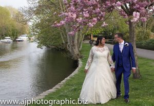 Shalini And Dan Daly wedding walking by river